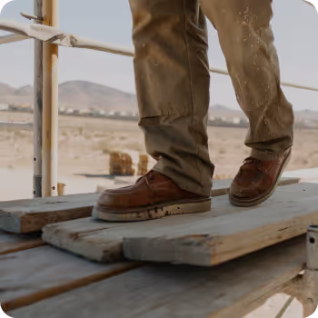 A person walking on a scafolding