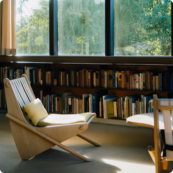 A cozy hotel lobby with lots of books