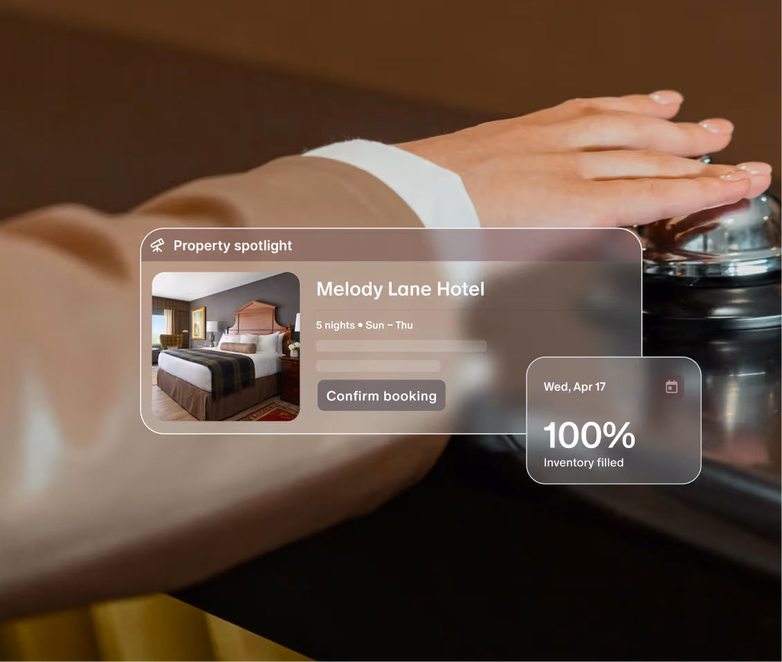 A person't hand in the background, and a hotel listing in the foreground